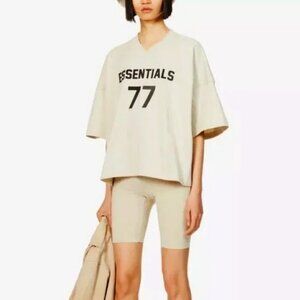 NWT FEAR OF GOD ESSENTIALS Short Sleeve 77 Football T-Shirt Wheat M